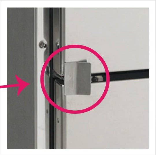A Vitrifrigo travel latch R12478DW.K set installed on a refrigerator door, with one latch on the right and one on the left.